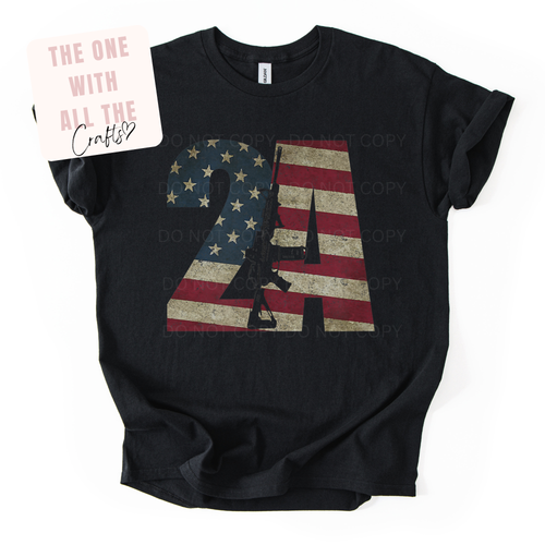Black t-shirt with American flag design and 2A image with rifle on a white background