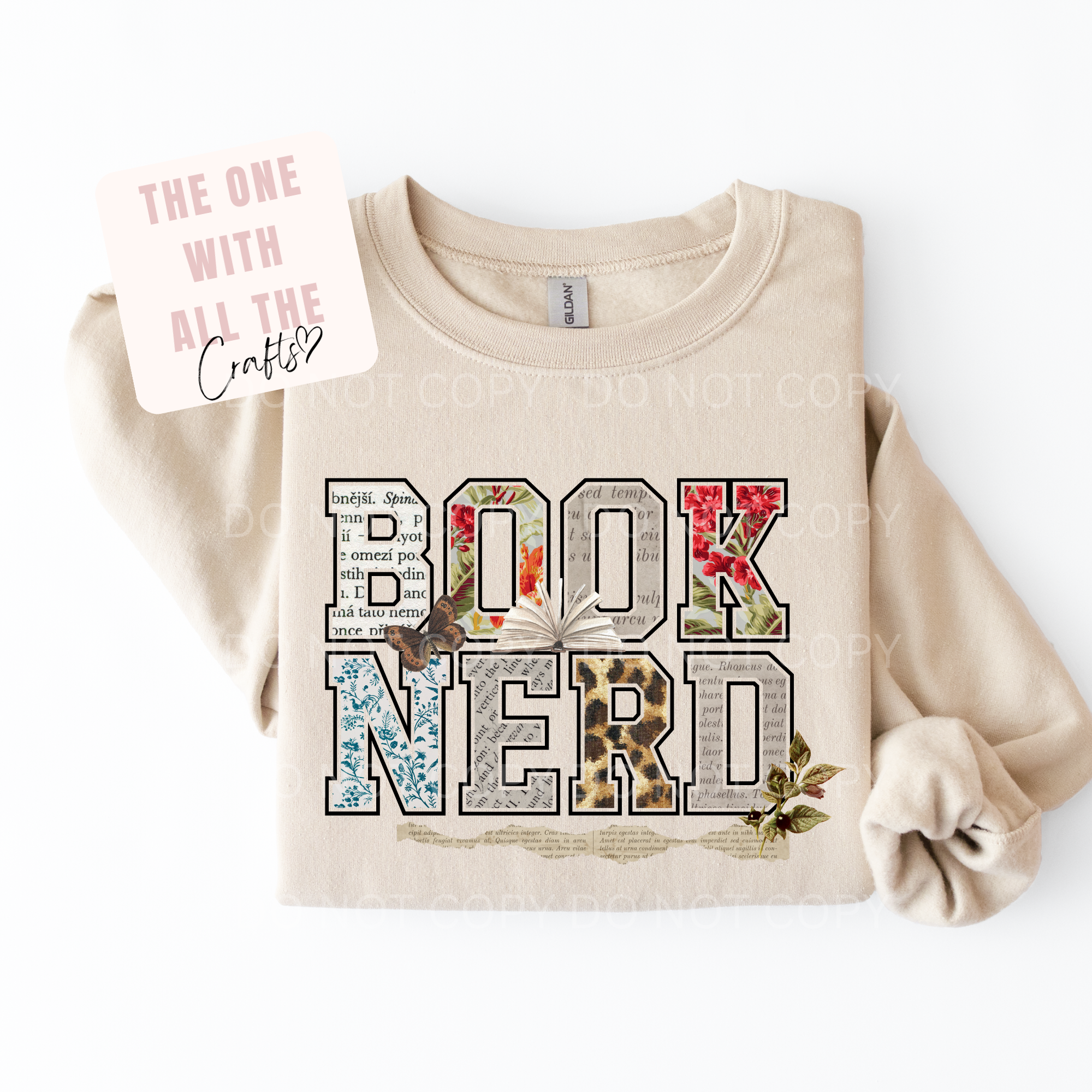 Beige sweatshirt with 'BOOK NERD' text on a white background