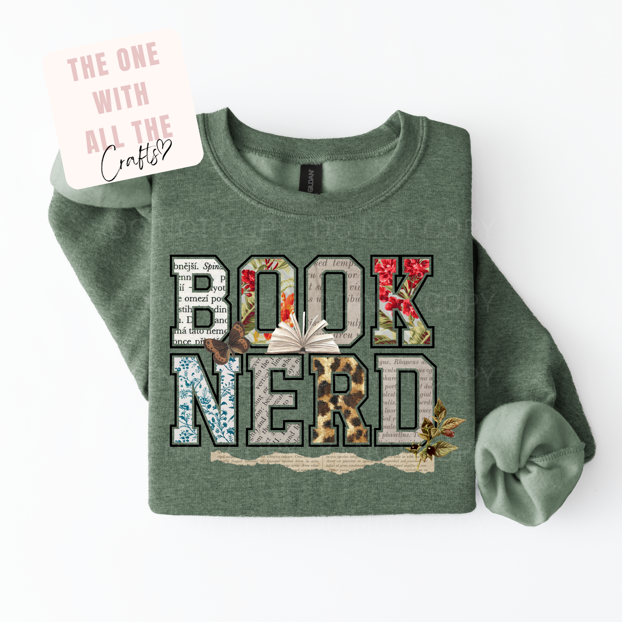 Green sweatshirt with 'BOOK NERD' text and floral designs on a white background