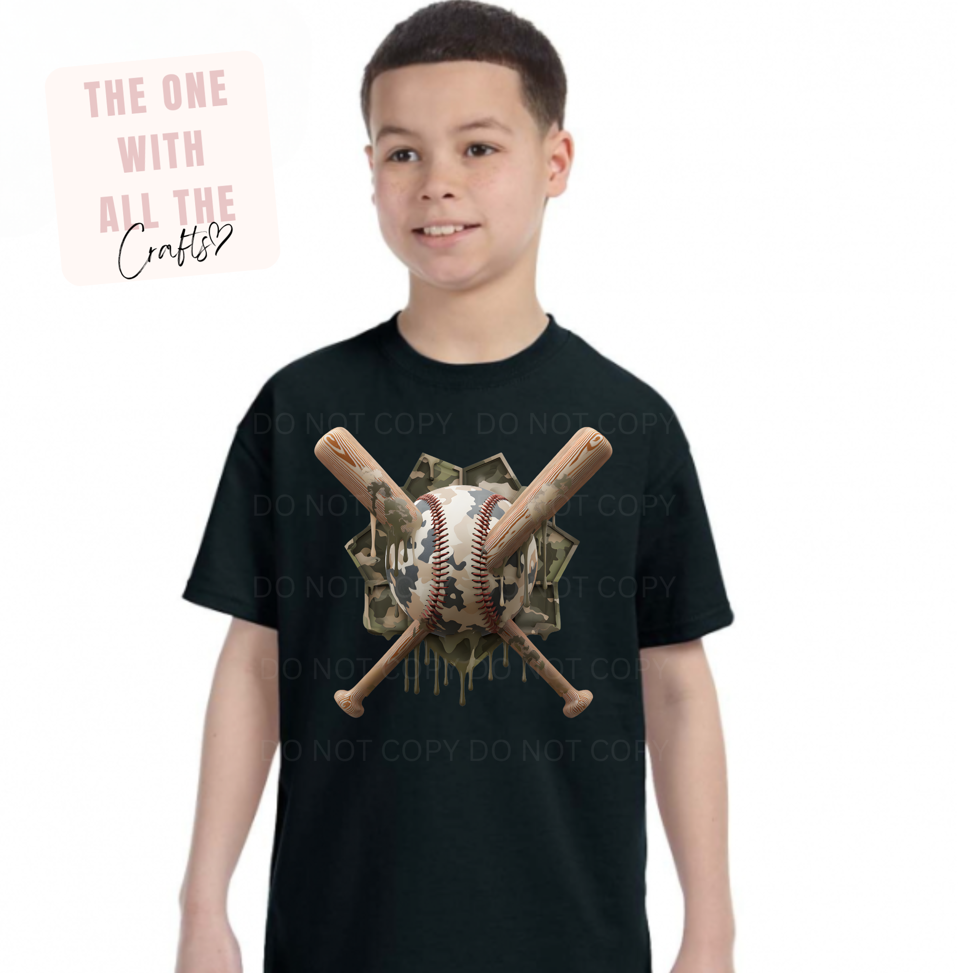 Child wearing a black t-shirt with a graphic design of crossed baseball bats and a ball, on a white background.