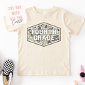 Yellow t-shirt with 'Fourth Grade' design on a camo background