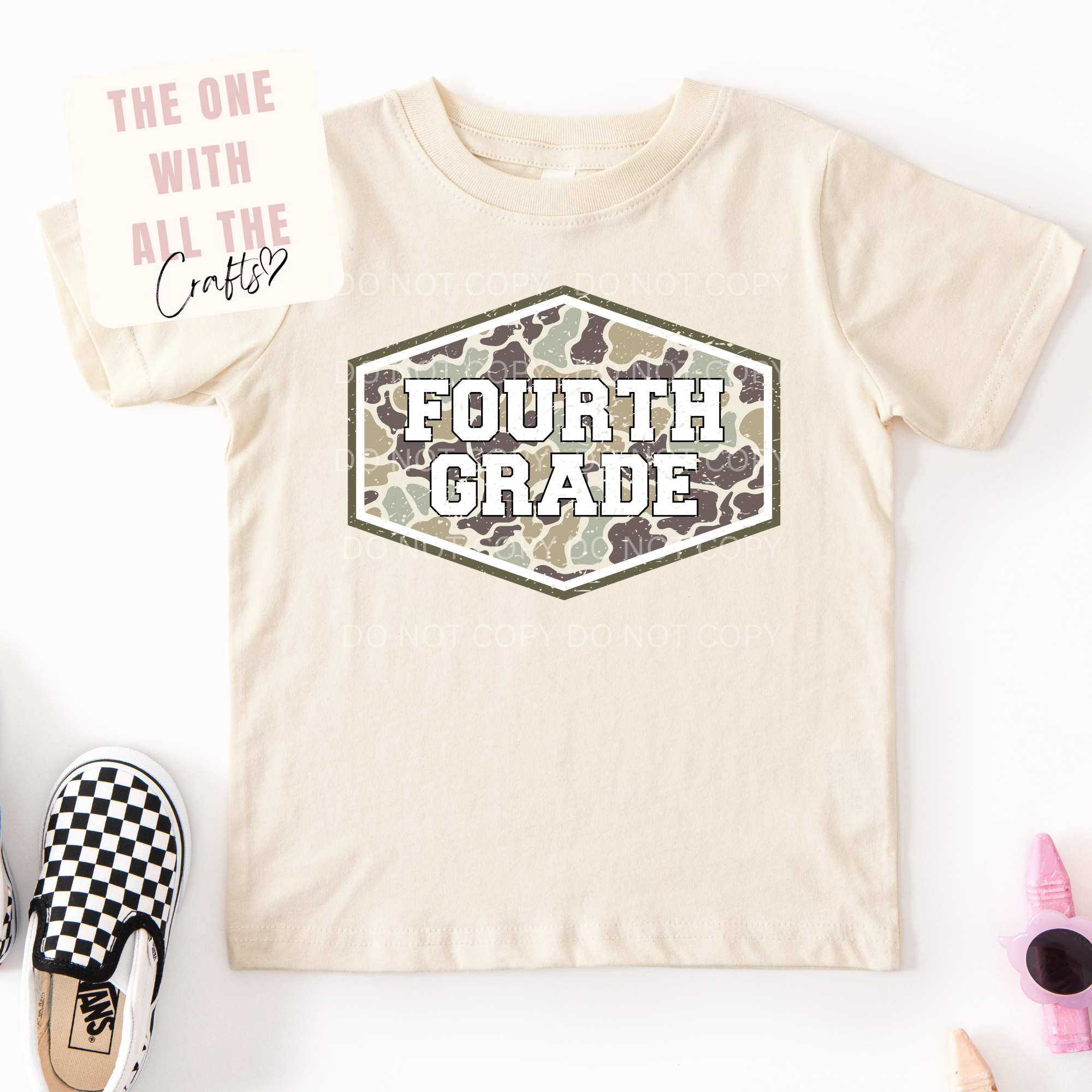 Yellow t-shirt with 'Fourth Grade' design on a camo background