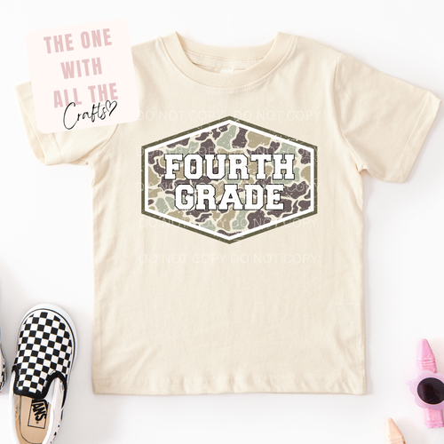 Yellow t-shirt with 'Fourth Grade' design on a camo background