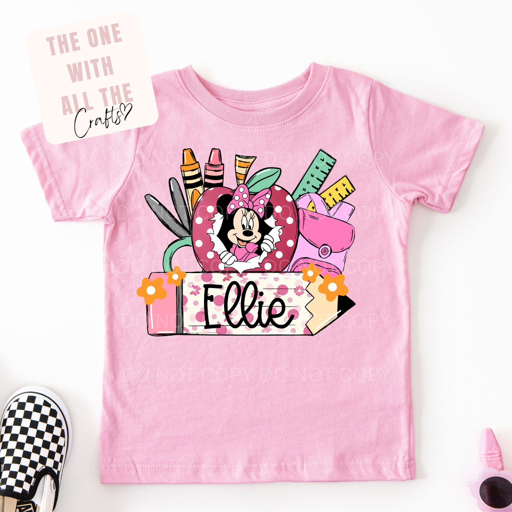Pink t-shirt with a colorful mouse graphic and text on a pink background