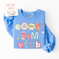 Blue sweatshirt with colorful 'Comfy Mom Club' text on a white background