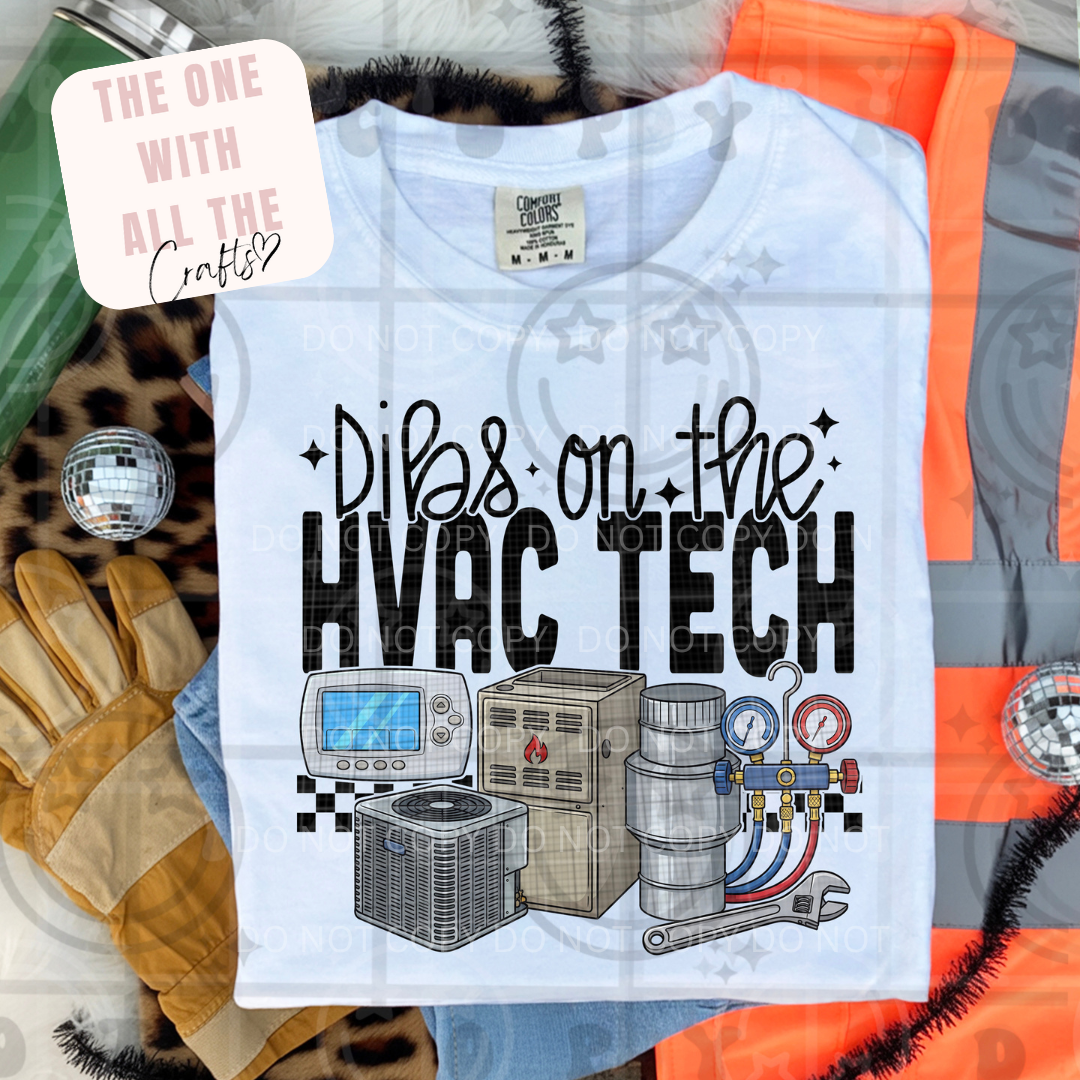 White t-shirt with 'Dibs on the HVAC Tech' graphic design on a colorful background