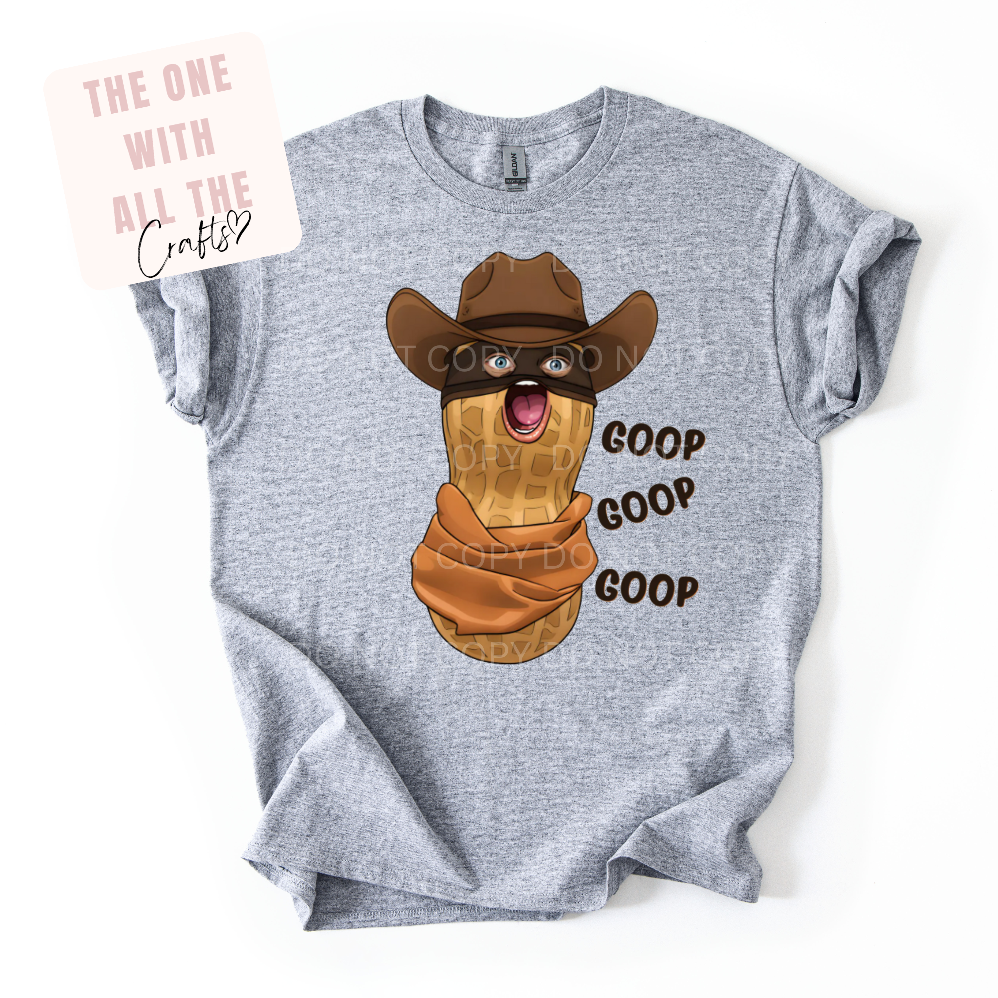 Gray t-shirt with a cartoon peanut wearing a cowboy hat and mask, and the text 'GOOP GOOP GOOP' on a white background.