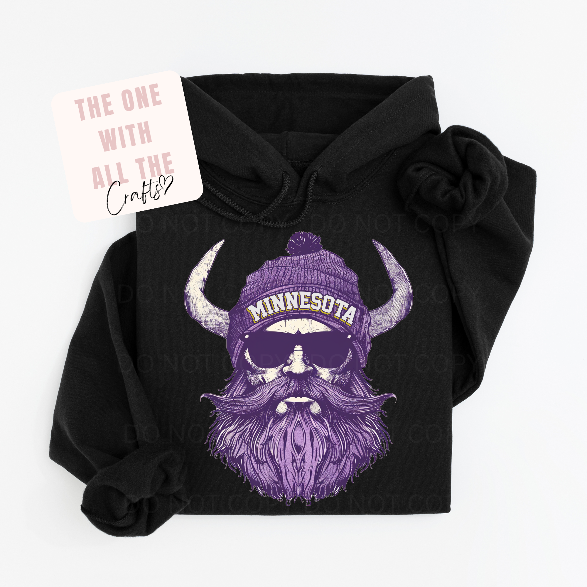 Black hoodie with a graphic of a bearded Viking wearing a Minnesota hat on a white background