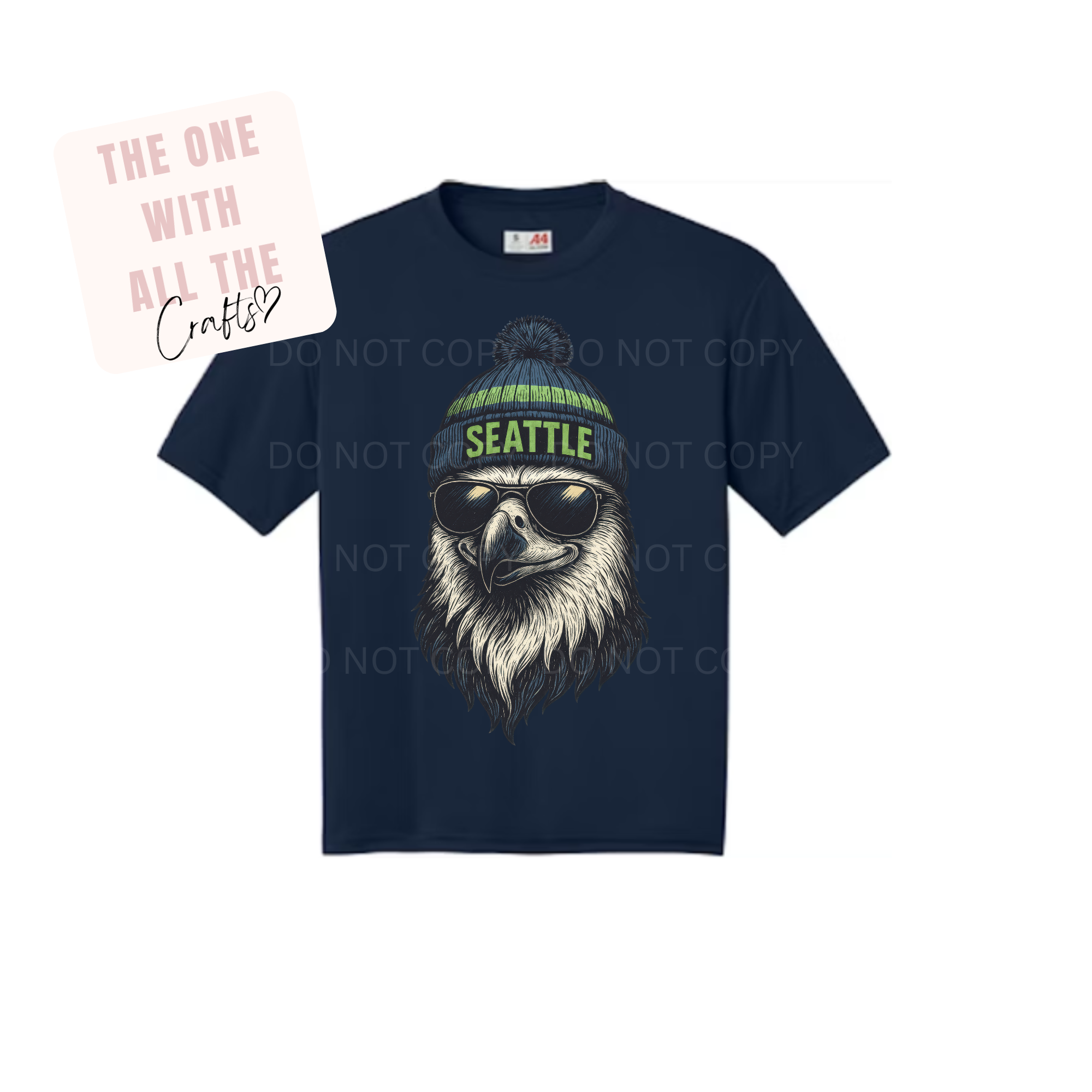 Navy blue t-shirt with a graphic of a bearded person wearing sunglasses and a 'Seattle' beanie on a white background.