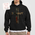 Black hoodie with graphic design and text worn by a person on a white background