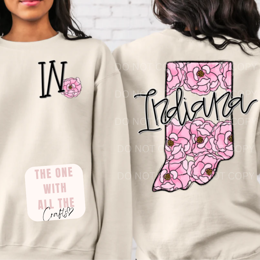 Two beige sweatshirts with floral 'Indiana' design and text on a white background