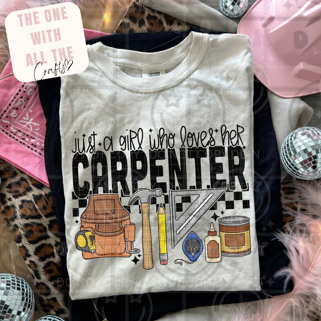 White t-shirt with graphic design and text 'Just a girl who loves her Carpenter' on a patterned surface.