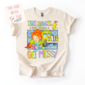 Beige t-shirt with colorful graphic and text on a white background. Whimsy tee