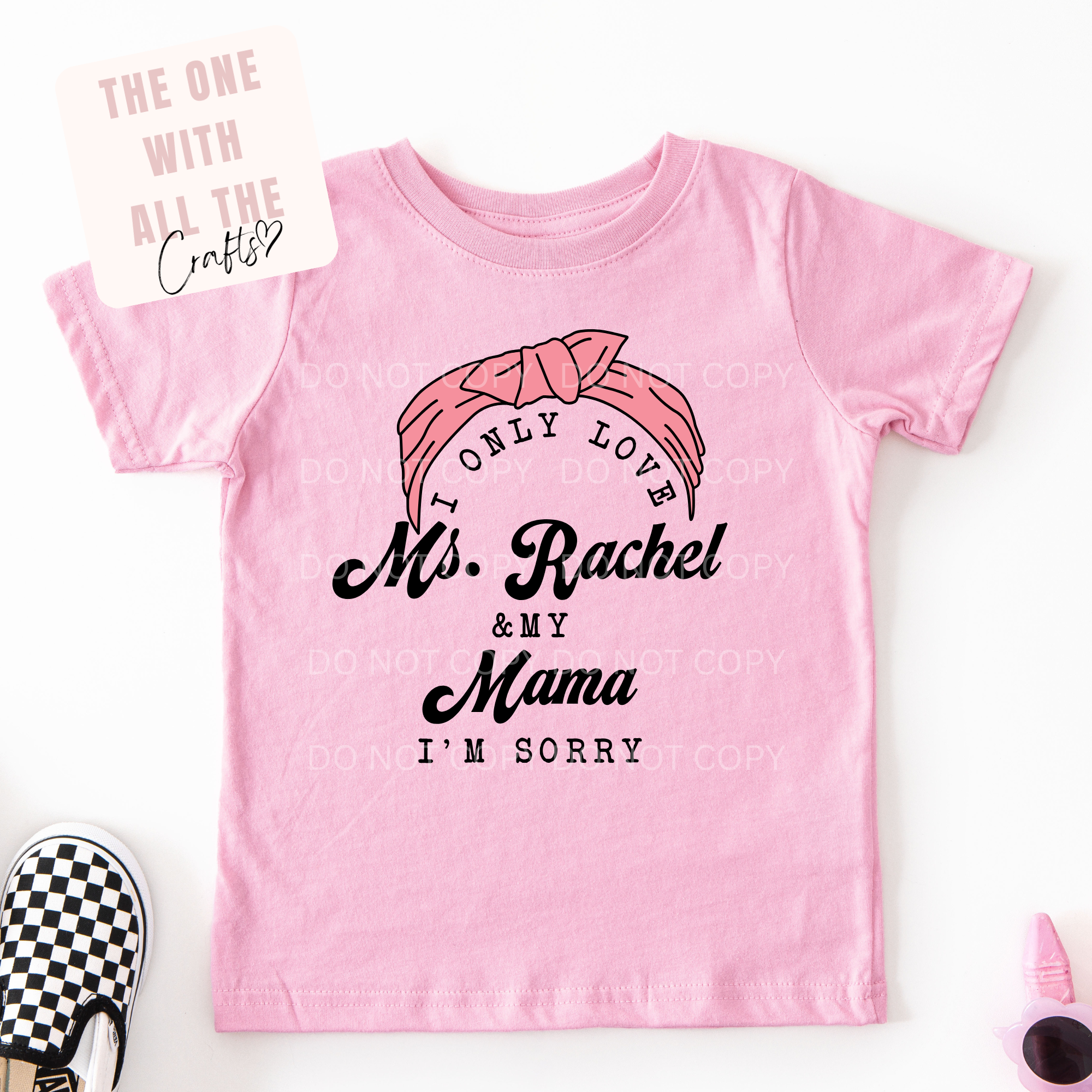 Pink t-shirt with text and graphics on a white background