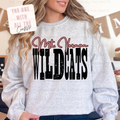 Person wearing a gray sweatshirt with 'Mt Vernon Wildcats' text, with a blurred background.