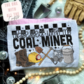 T-shirt with 'Obsessed with my Coal Miner' design on a decorative background with tools and jewelry.