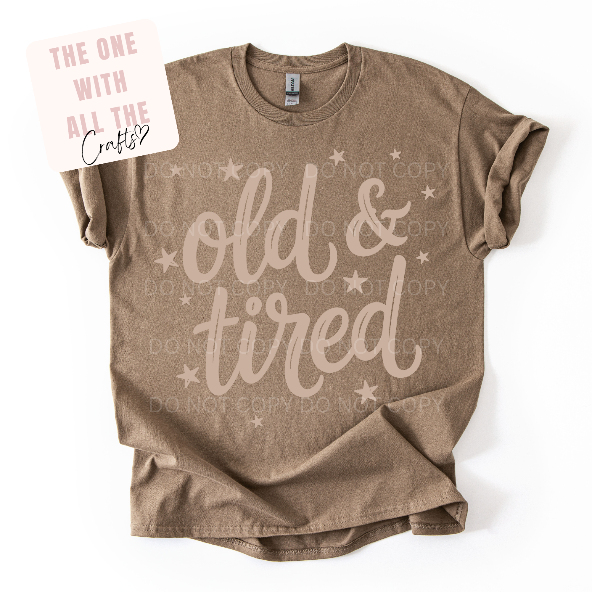 Brown t-shirt with 'old & tired' text on a white background