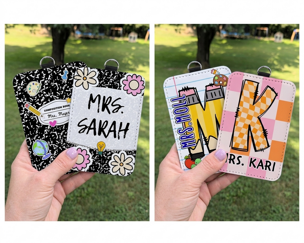 Two name tags held by hands with a grassy background