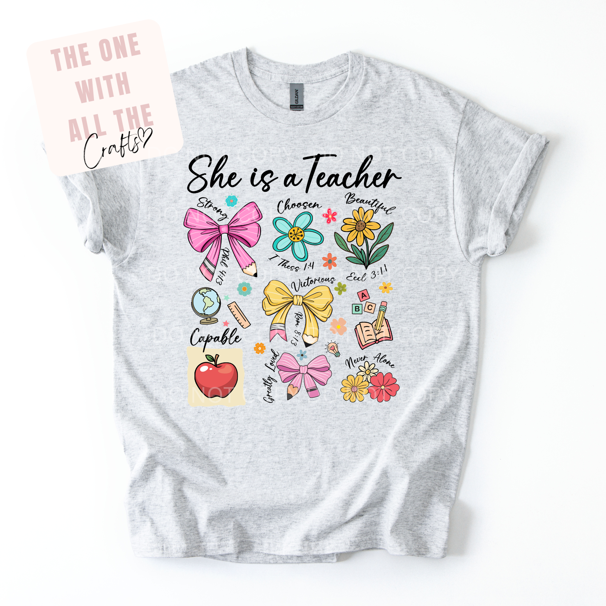 Gray t-shirt with colorful graphics and text 'She is a Teacher' on a white background