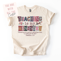 Beige t-shirt with colorful text design on a white background
