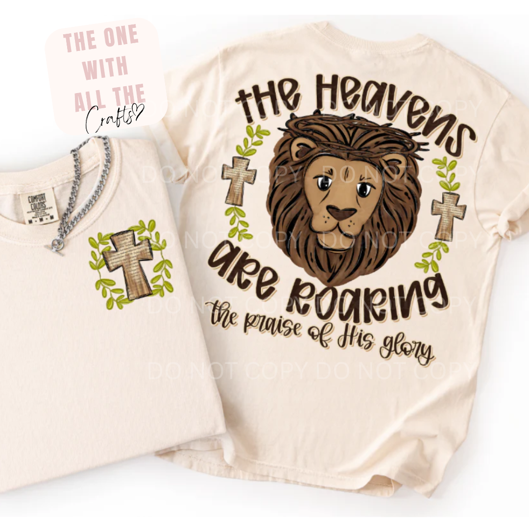 Tee shirt with the words 'The Heavens Are Roaring' on a plain white background
