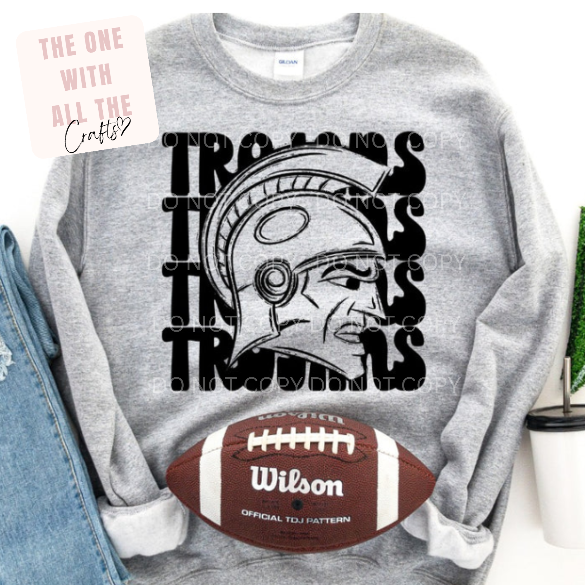 Gray sweatshirt with Trojan helmet graphic and Wilson football on a white background