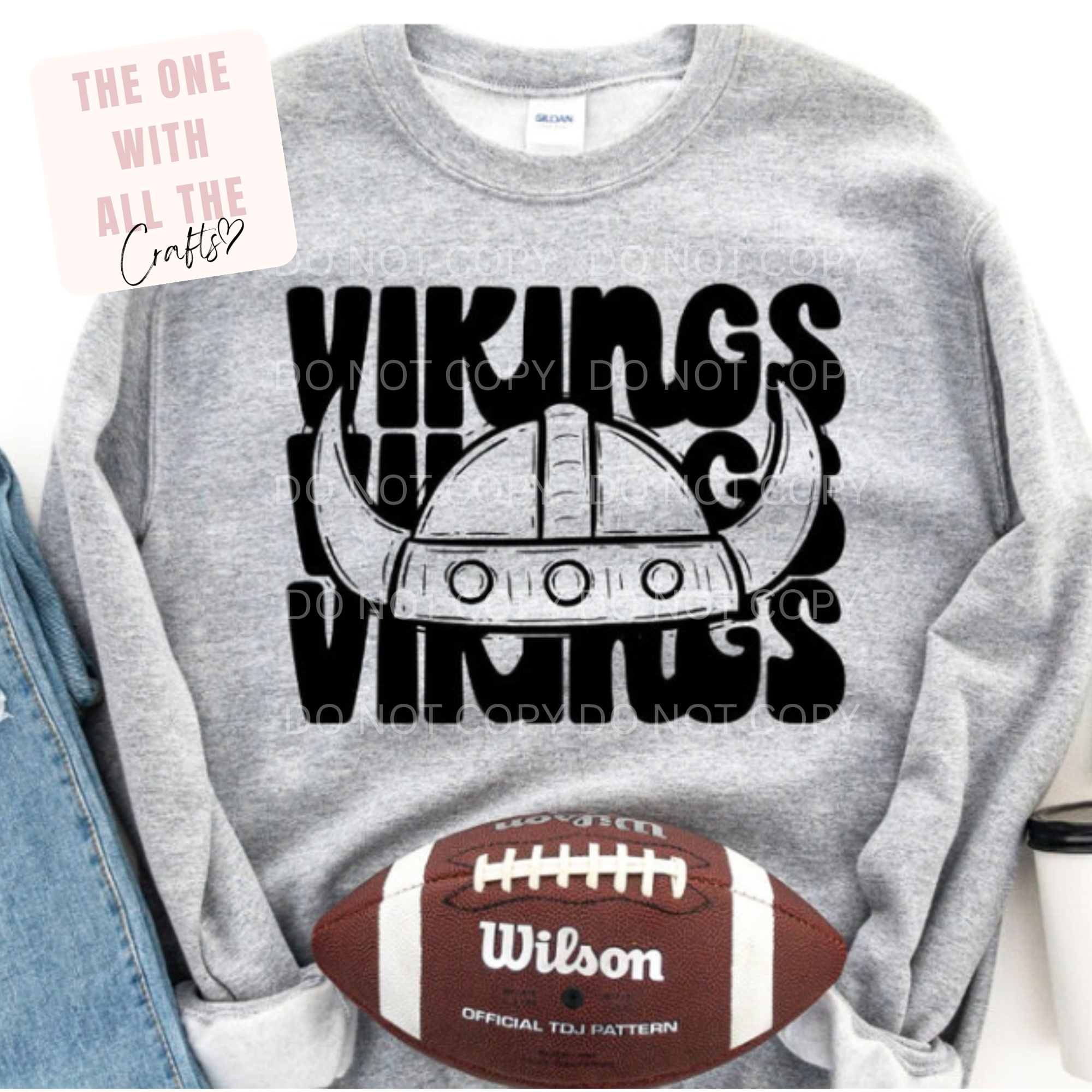 Gray sweatshirt with 'Vikings' design and football graphic, featuring the brand 'Wilson'.