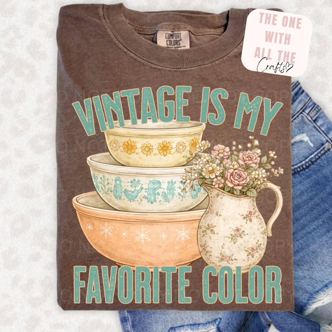 T-shirt with 'Vintage is my favorite color' design on a textured surface