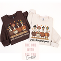 Two long-sleeve crewneck sweatshirts laid flat on a white background. The left sweatshirt is dark brown with a graphic of four turkeys and the text 'just a thankful goose'.